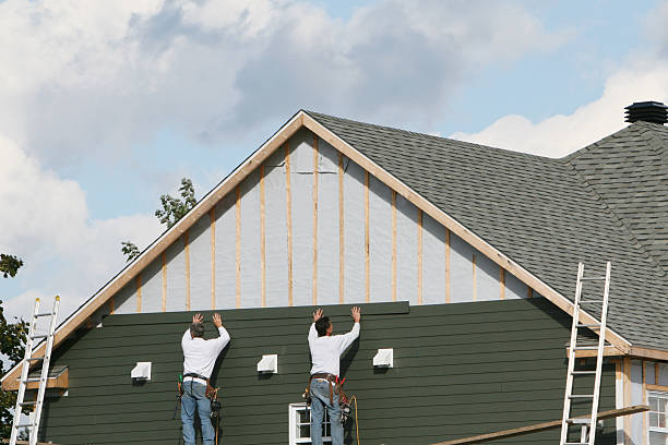 Professional Siding Repair technician working in Riva, MD
